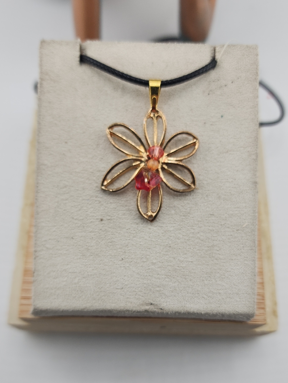 Gold Floral Pendant Necklace with Pink Accents